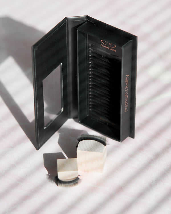Beutimi FauxMink Lashes 0.03MM black packaging box open with cream applicator brushes displayed in front
