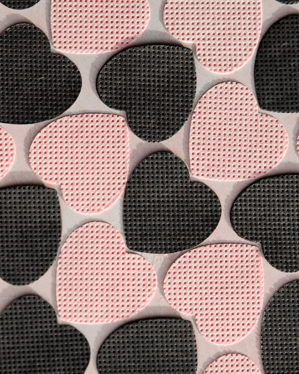 Beutimi Lint Free Adhesive Wipes in pink and black heart shapes arranged in alternating pattern on white background