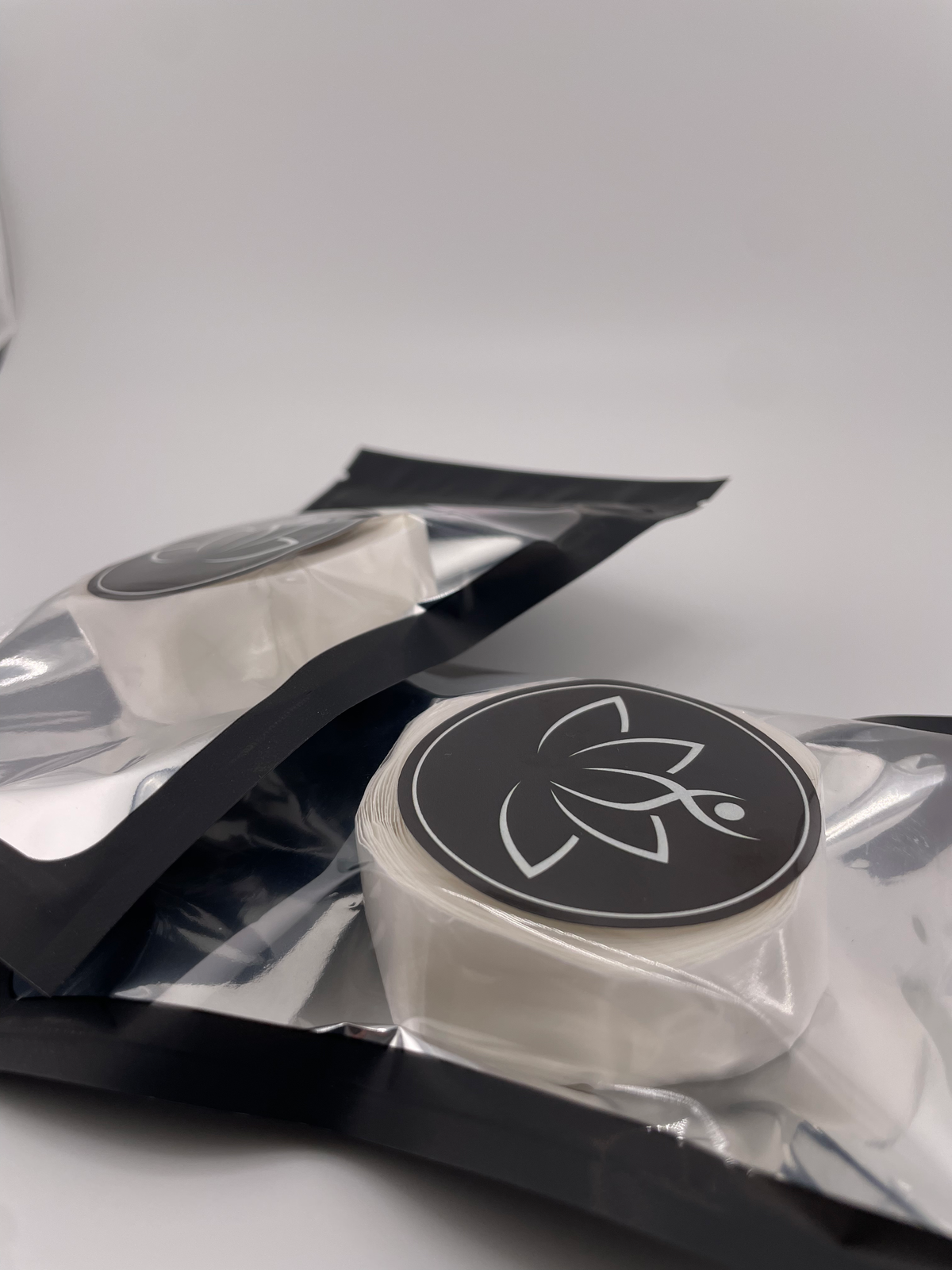 Beutimi Sticky Dots For Lotus Bouquet Flower Cup displayed in clear packaging with black ribbon and label on white surface