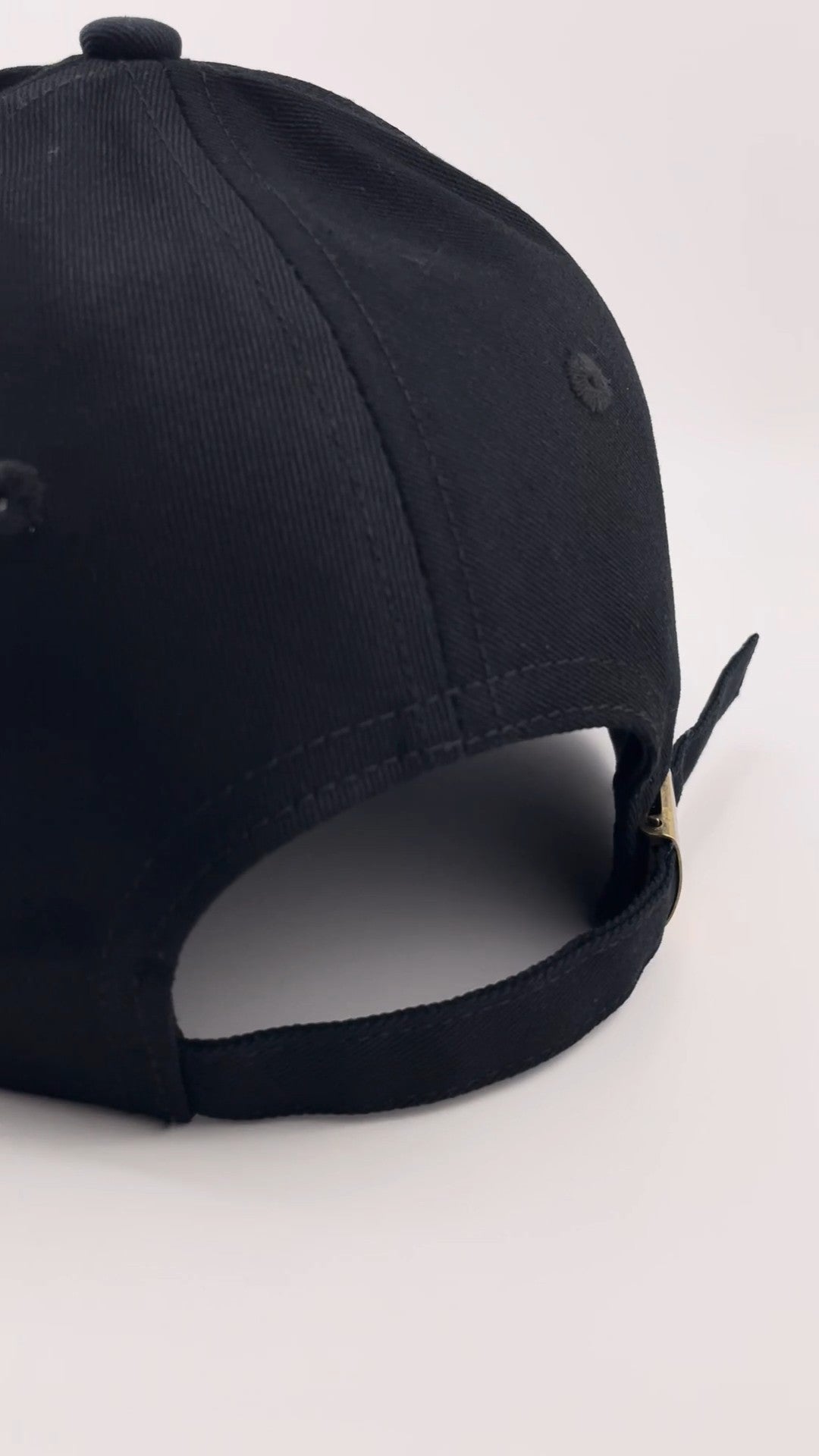 Black Beutimi Luxe Logo Hat – Limited Edition shown from side angle with adjustable back strap and embroidered logo detail