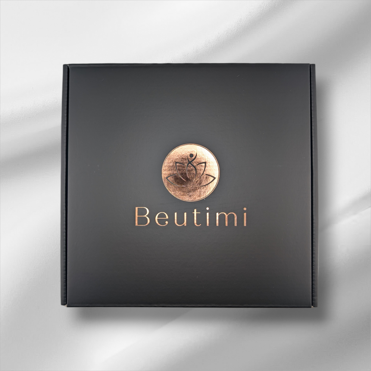 Beutimi Pro Kit black square packaging with copper circular logo and gold text displayed from above