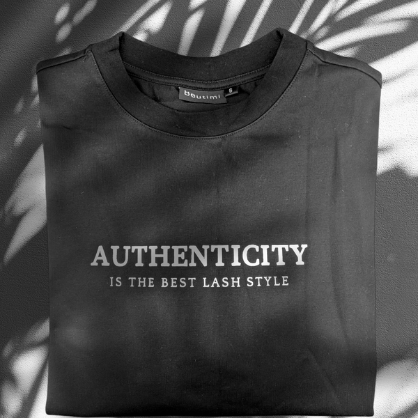 Black Beutimi Authentic T-Shirt with white "Authenticity is the Best Lash Style" text, displayed flat lay with shadow details